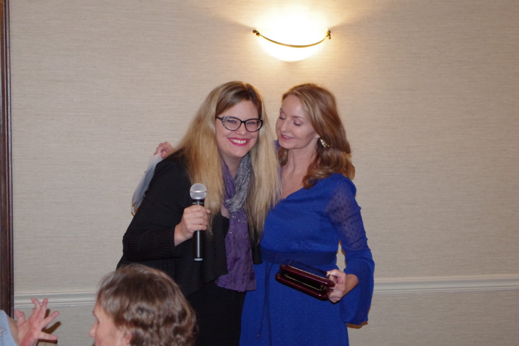 Mary Beth presenting Ann Hagemann, actress and emcee of event, with Special Recognition award.